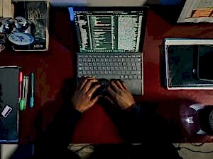 laptop with man typing